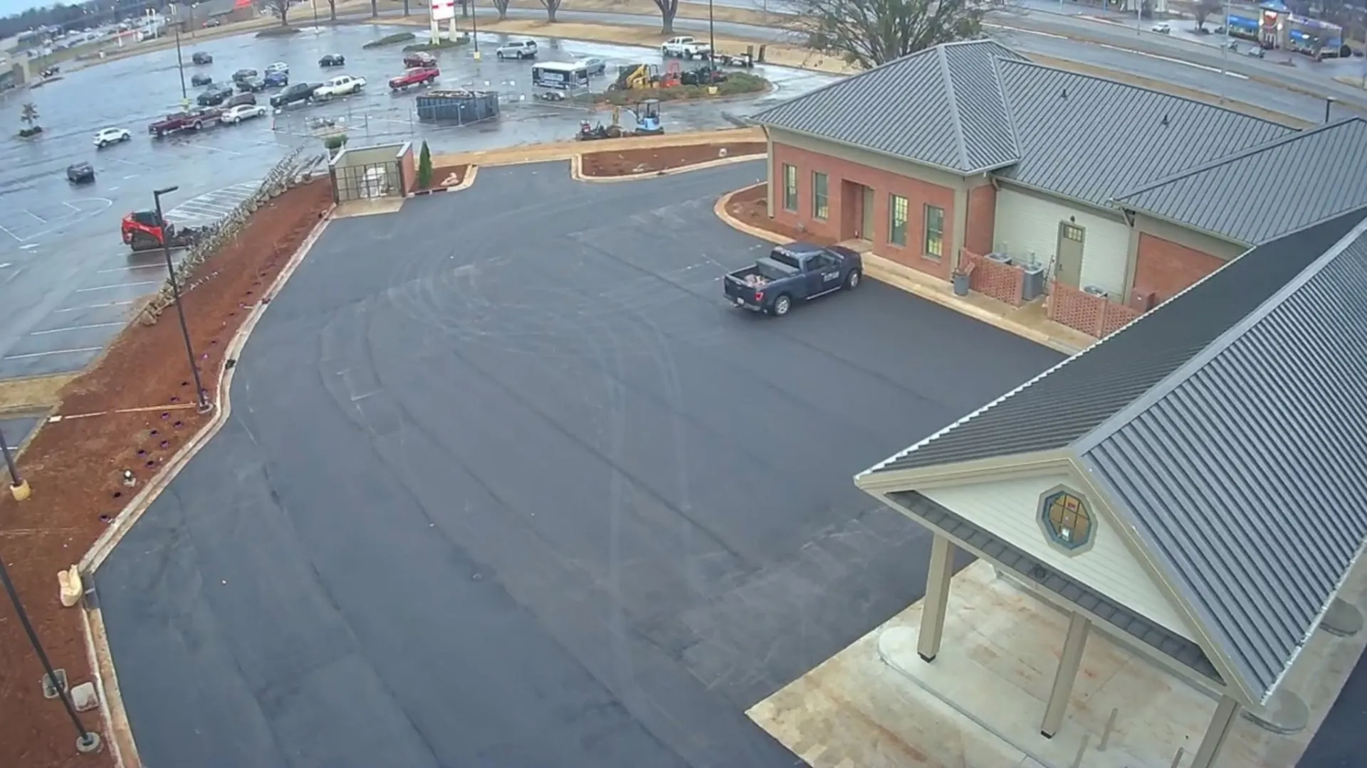 Aerial of a paved apartment complex with pool area in Alabama