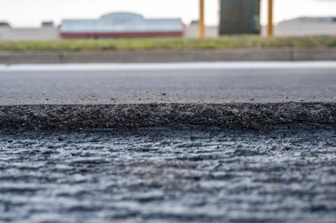 Aerial of a hotel drive with fresh asphalt paving in North Alabama