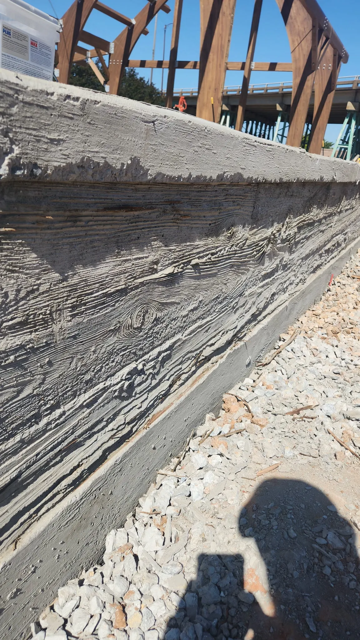 Close-up detail of finished concrete curb work