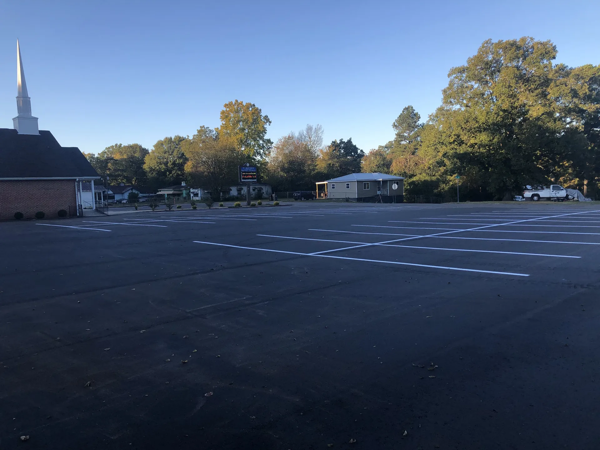 Freshly painted parking lot striping by Project One Contracting